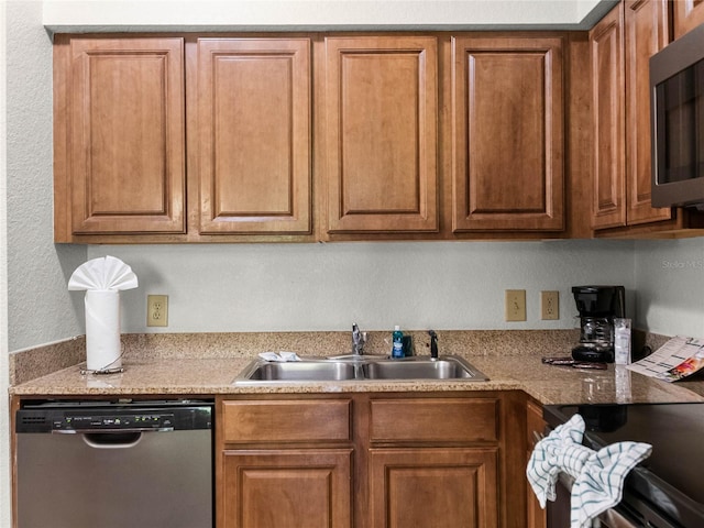 kitchen with sink and stainless steel appliances