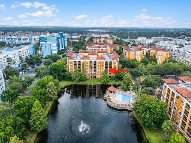 bird's eye view with a water view