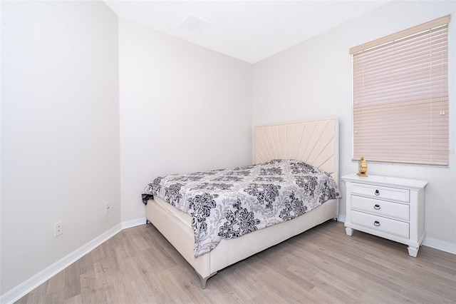 bedroom featuring light wood-type flooring