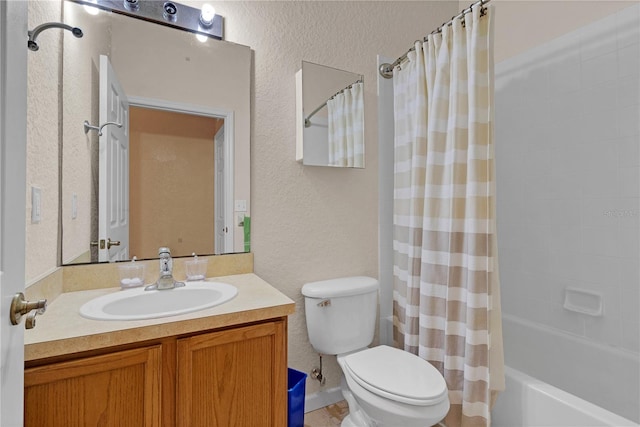 full bathroom with shower / bathtub combination with curtain, toilet, and vanity