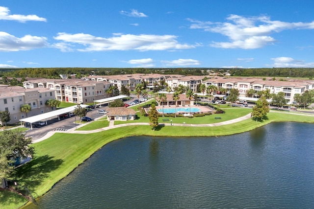 birds eye view of property featuring a water view