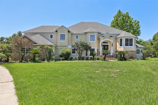 view of front of house with a front lawn