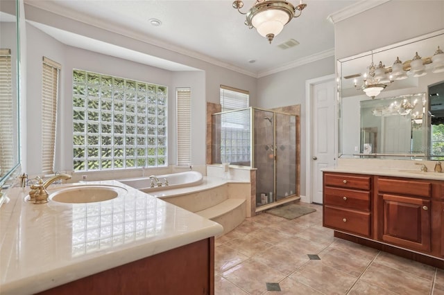 bathroom with an inviting chandelier, tile flooring, ornamental molding, independent shower and bath, and vanity