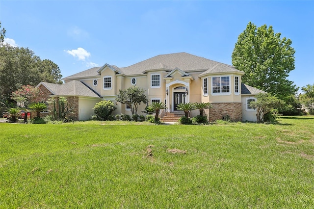 view of front facade with a front lawn