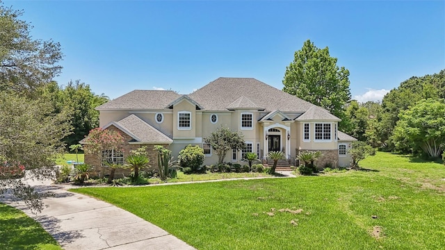 view of front of property with a front lawn