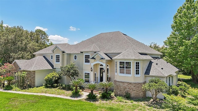 view of front of home featuring a front lawn