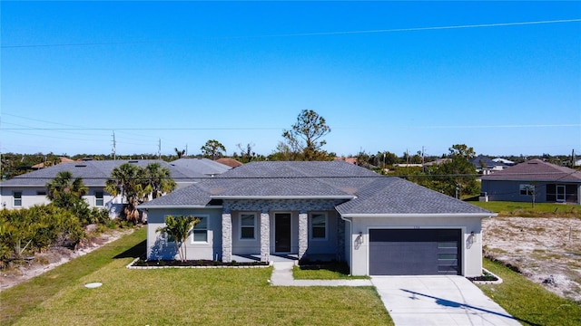 ranch-style house featuring stucco siding, a front lawn, concrete driveway, and an attached garage