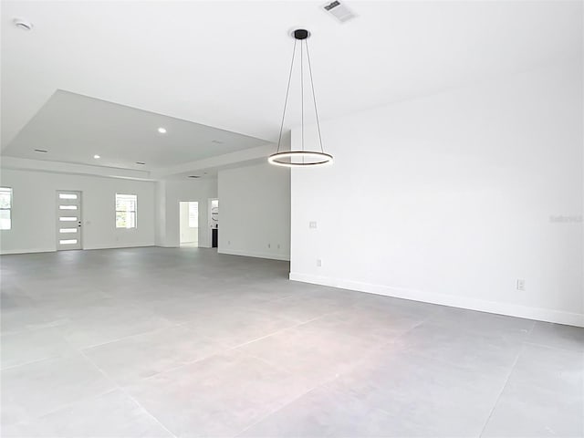 interior space with recessed lighting, baseboards, and visible vents