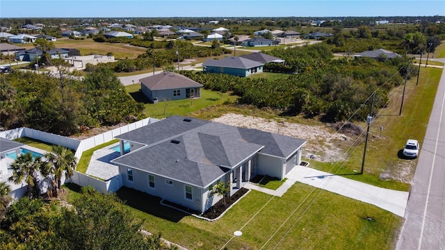 drone / aerial view with a residential view