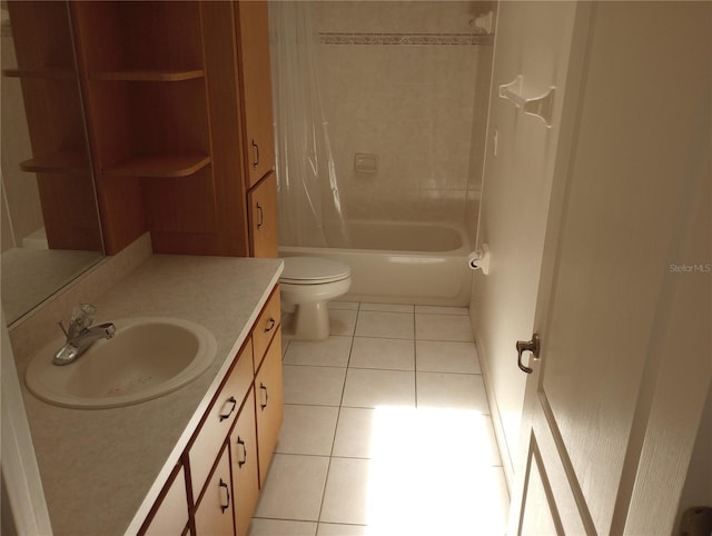 full bathroom with tile patterned flooring, vanity, toilet, and shower / bath combo with shower curtain