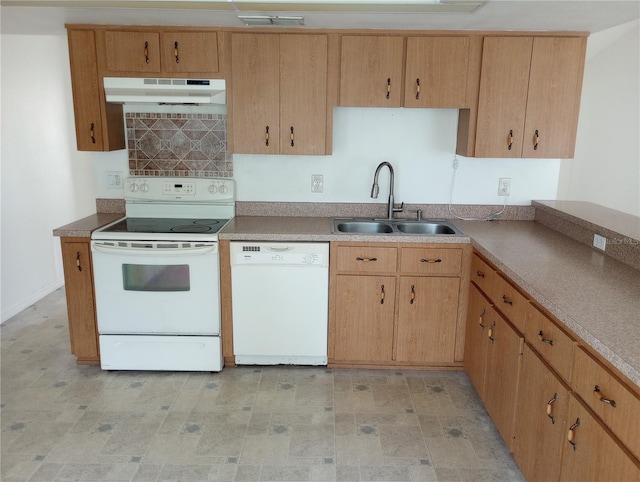 kitchen with white appliances and sink