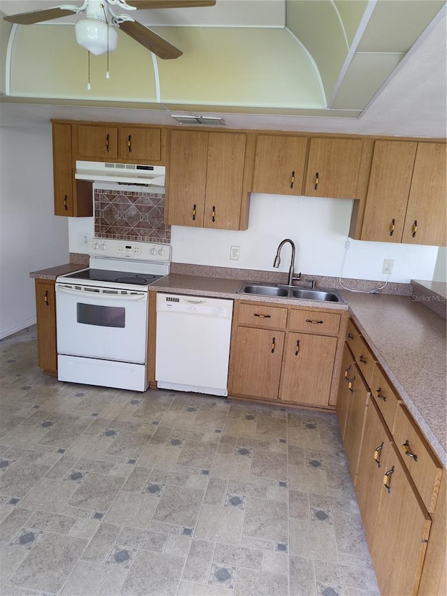 kitchen featuring white appliances, tasteful backsplash, ceiling fan, and sink