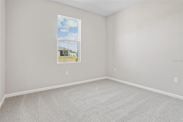 unfurnished room featuring carpet floors