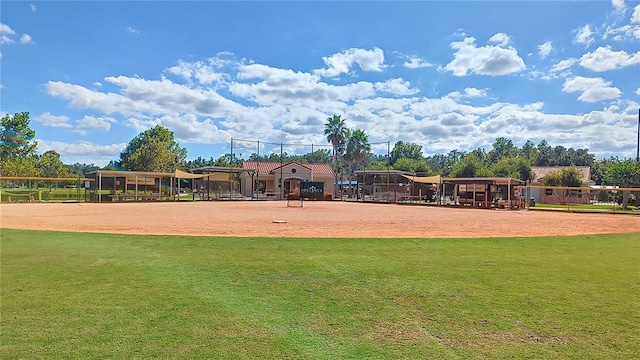 exterior space featuring volleyball court and a lawn