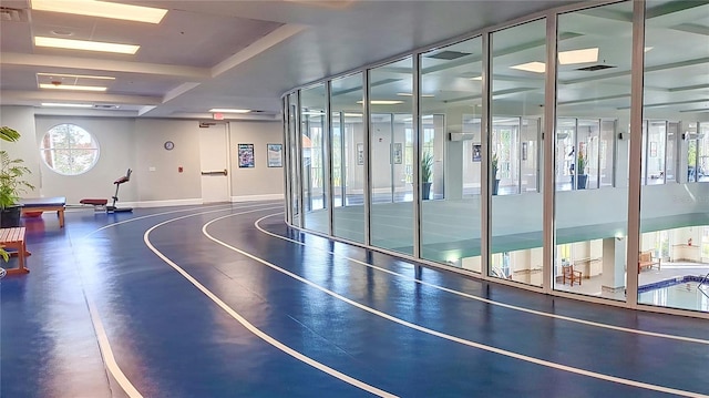 view of basketball court with a skylight