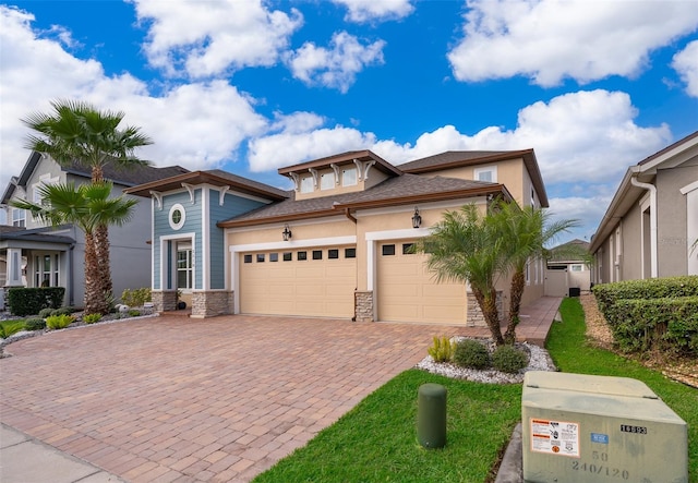 view of front of home with a garage