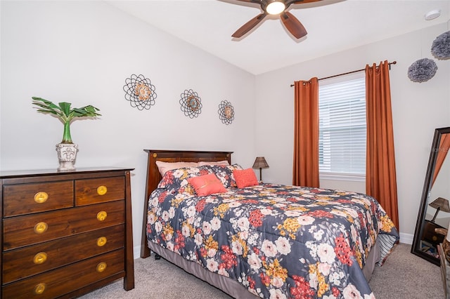 bedroom featuring ceiling fan and light colored carpet