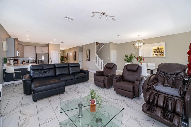 living room with a chandelier