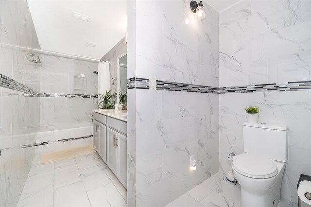 bathroom with vanity, toilet, and curtained shower