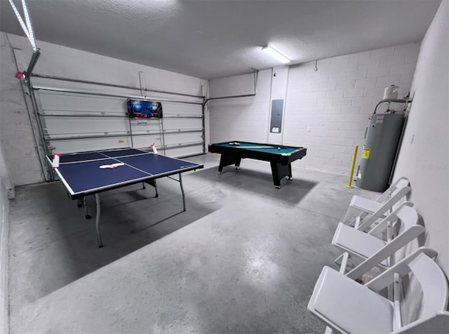 recreation room featuring electric panel, a textured ceiling, pool table, and water heater