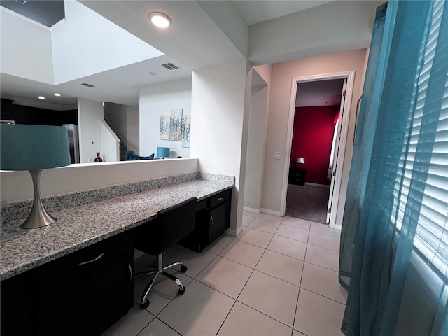 bathroom with tile patterned floors