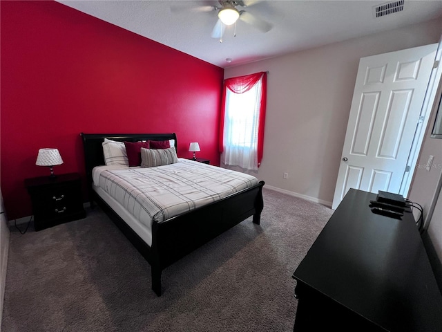 carpeted bedroom with ceiling fan