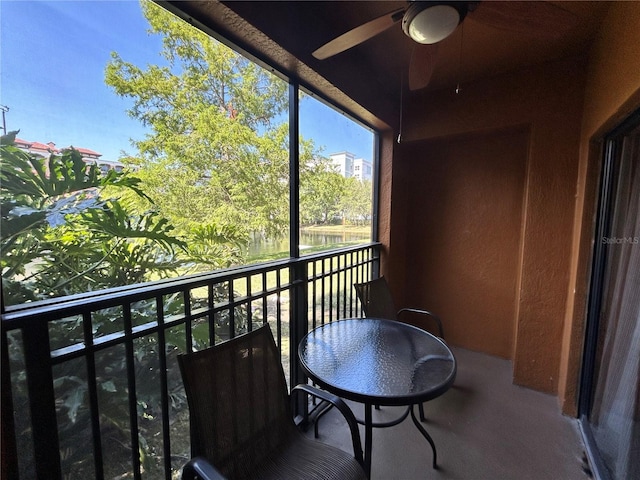 balcony featuring ceiling fan