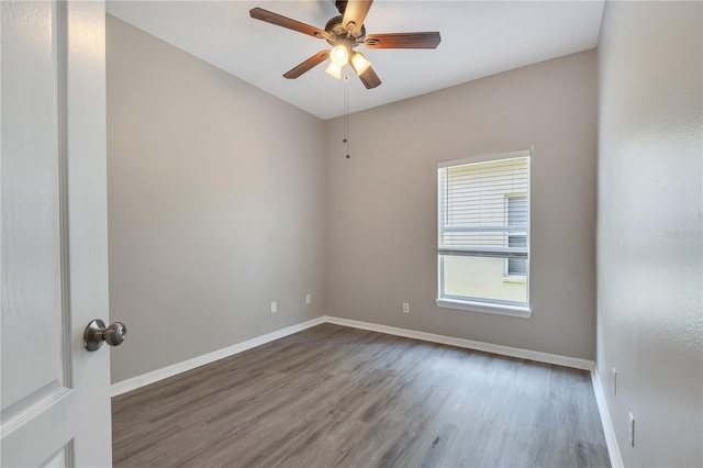 spare room featuring ceiling fan and wood-type flooring