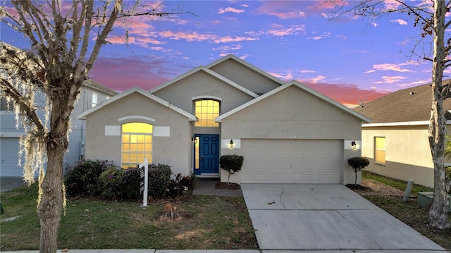 view of front of property featuring a garage