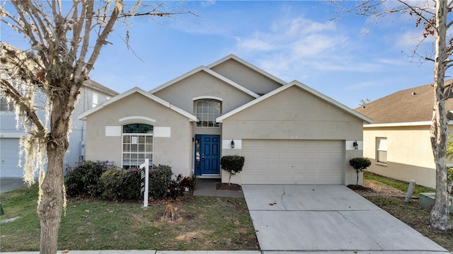 view of front of home with a garage