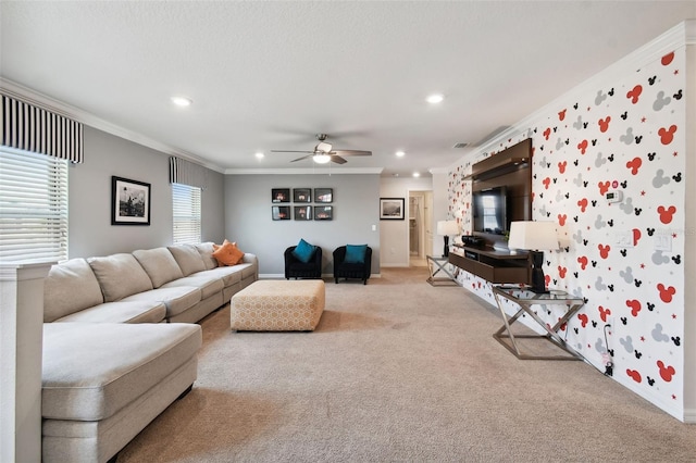 carpeted living room with ceiling fan and crown molding