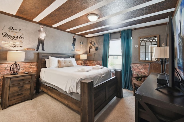 carpeted bedroom featuring a textured ceiling