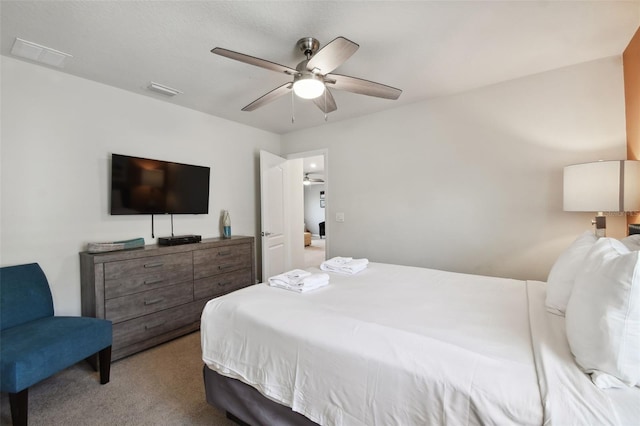 bedroom featuring ceiling fan and carpet floors