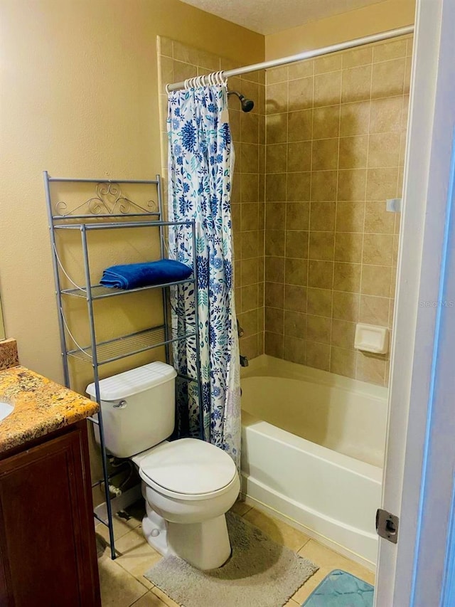 full bathroom with tile patterned floors, vanity, shower / tub combo, and toilet