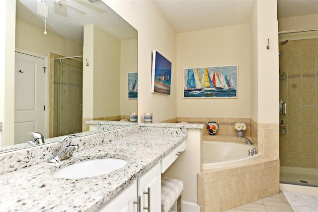 bathroom with tile patterned flooring, vanity, separate shower and tub, and ceiling fan