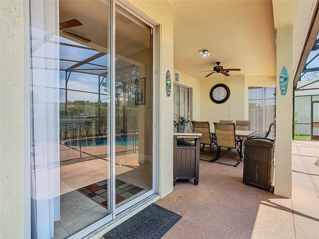 view of patio / terrace featuring ceiling fan