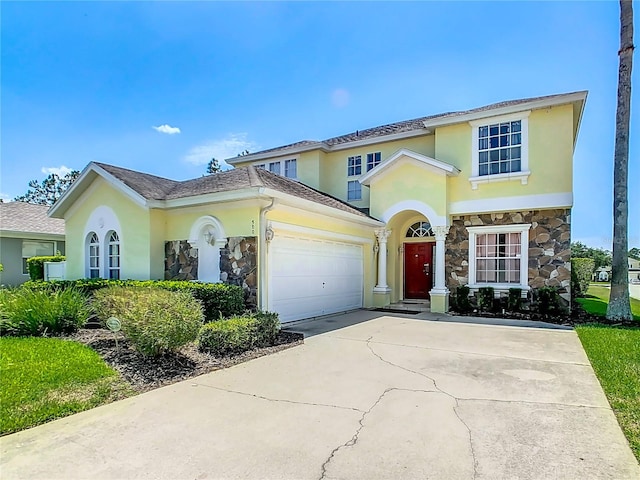 view of front of home with a garage