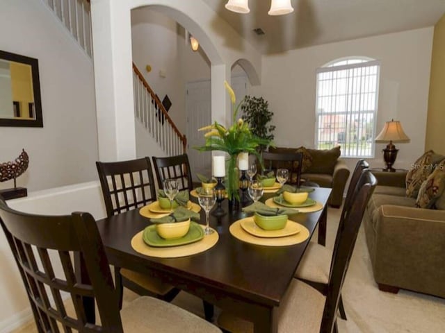 view of carpeted dining area