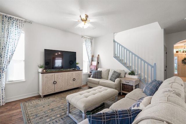 living room with hardwood / wood-style floors and ceiling fan