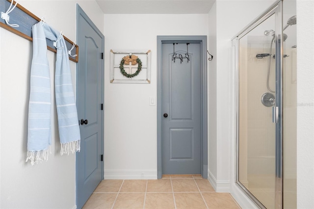 bathroom featuring tile patterned floors and walk in shower