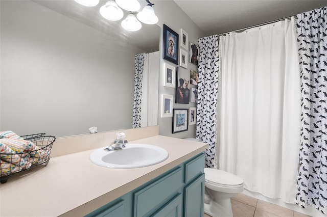 bathroom featuring tile patterned floors, a textured ceiling, toilet, vanity, and a shower with shower curtain