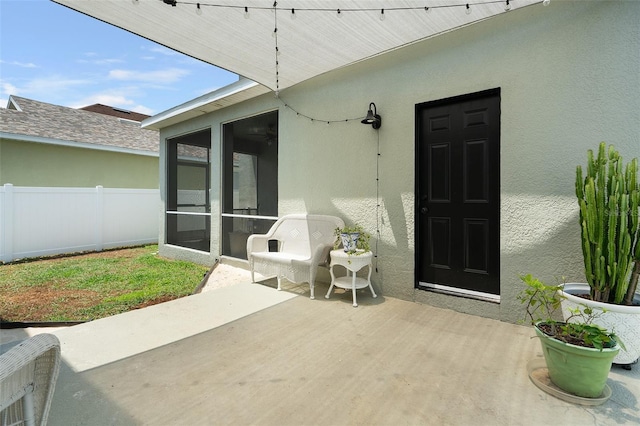 doorway to property featuring a patio