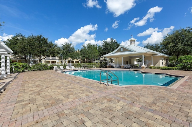 view of pool featuring a patio area