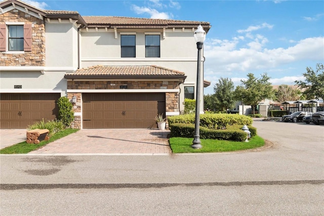 view of front of property featuring a garage