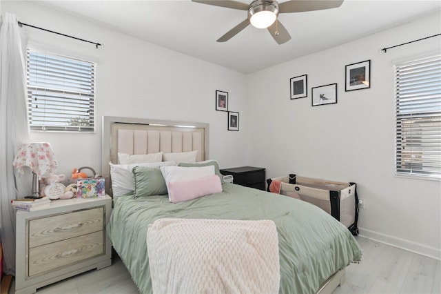 bedroom featuring ceiling fan and light hardwood / wood-style floors