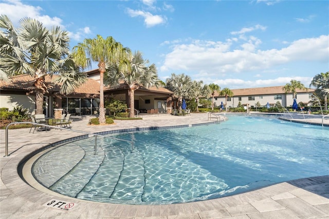 view of pool featuring a patio