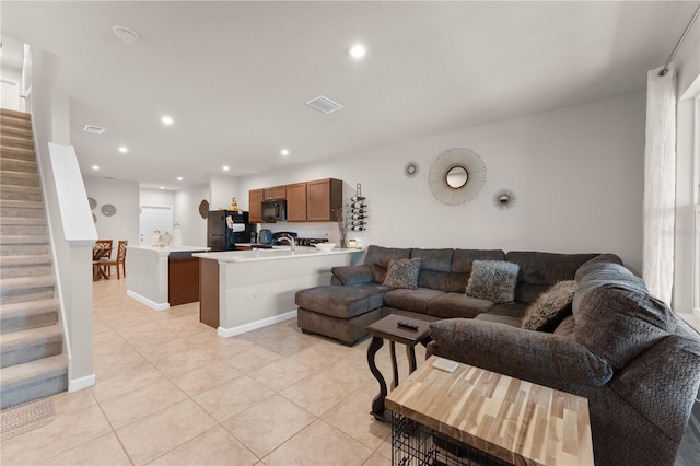 living room featuring light tile patterned floors