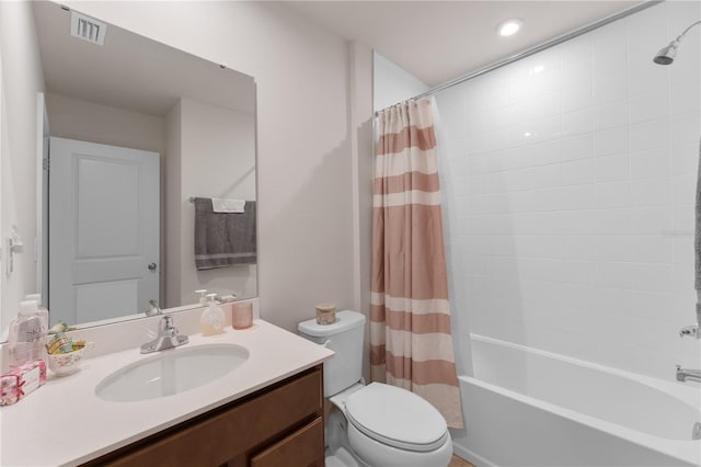 full bathroom featuring vanity, toilet, and shower / bathtub combination with curtain