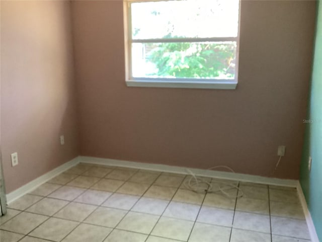 view of tiled spare room