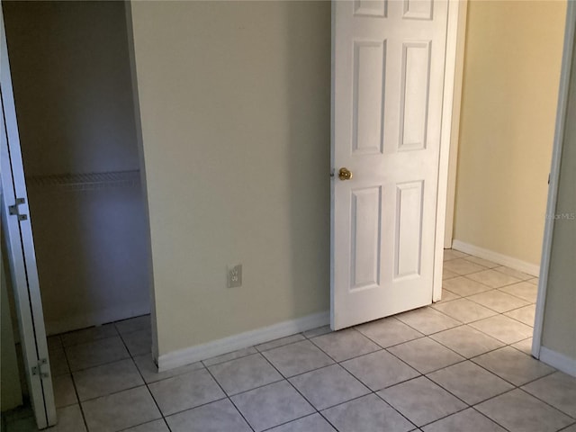 101 Albert St, Winter Springs, FL 32708 - unfurnished bedroom featuring light tile patterned floors, baseboards, and a closet